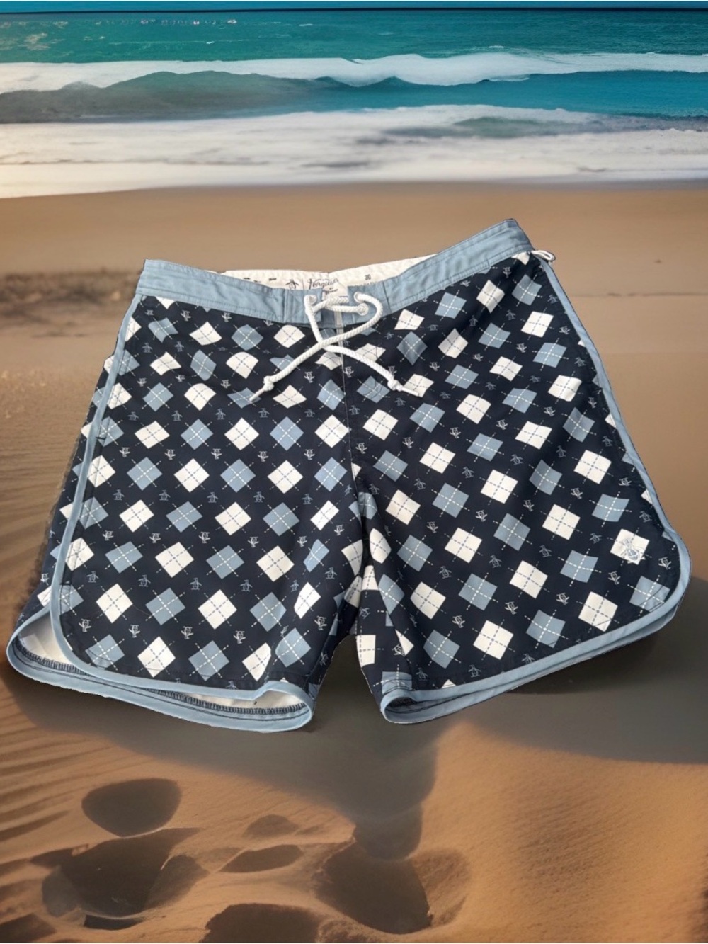 Original Penguin by Munsingwear men's size 30 swim trunks. Multicolor. Great Con